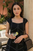 Elegant black midi dress outfit