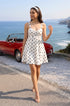 White polka mini dress